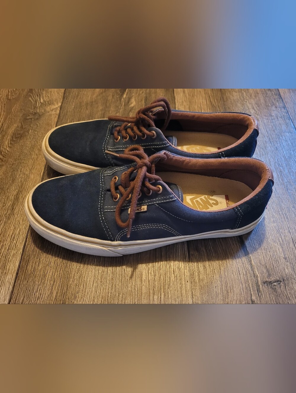 Navy blue suede Vans skateboarding shoes with brown shoe laces. Size 10